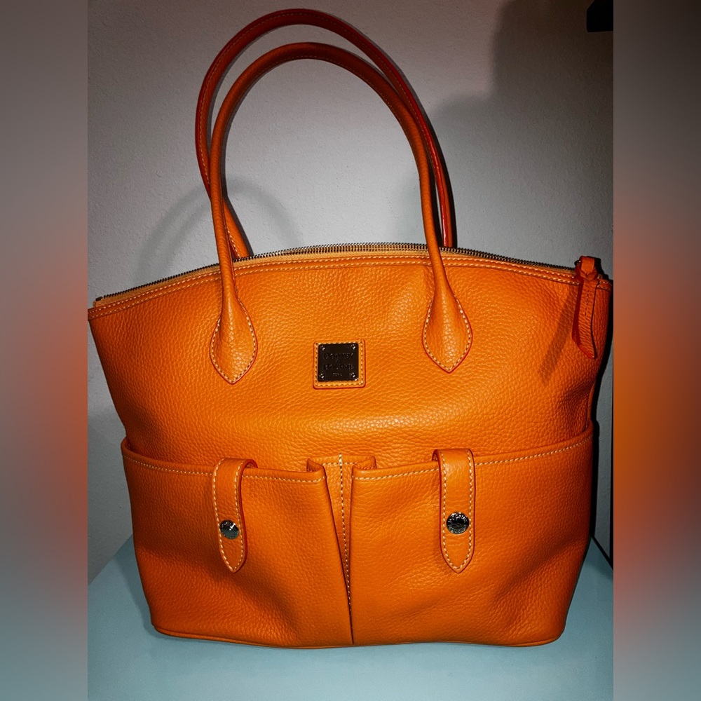 Large hobo style orange bag by Dooney & Bourke - brand new